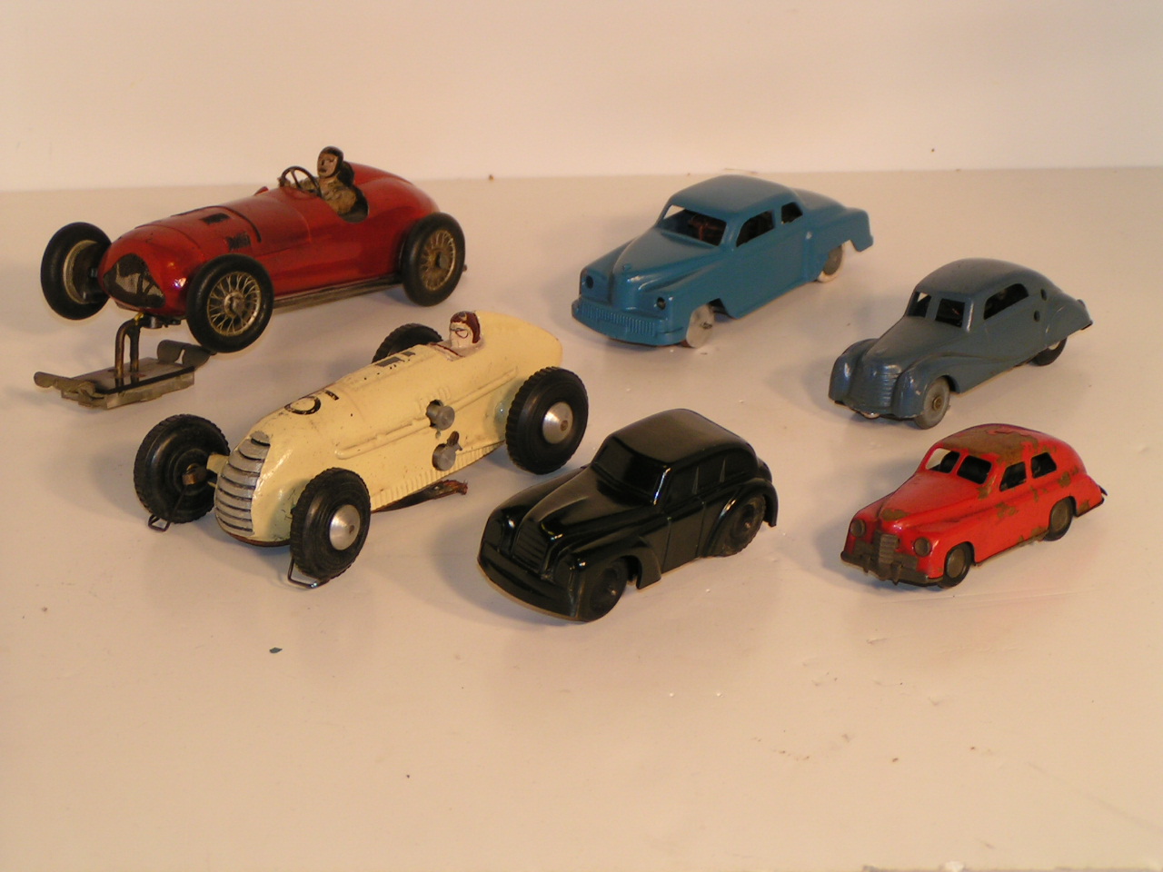 VARIOUS ELECTRIC CARS CARS MADE BEFORE 1956 FROM DIFFERENT COUNTRIES.