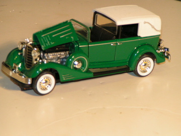 1/32ND SCALE DIECAST 1933 CADILLAC TOWN CAR. SHOWING THE MOTOR. ONLY 6 UNITS MADE.