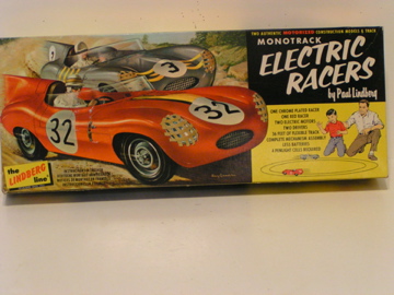 BOX FOR THE 1/24TH SCALE JAG DS.THEY RUN ON 2 PLASTIC RAIL LIKE TUBES .