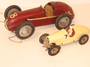 ARCADE RACER NEXT TO A 1934 GERMAN MARKLIN TO SHOW SIZE