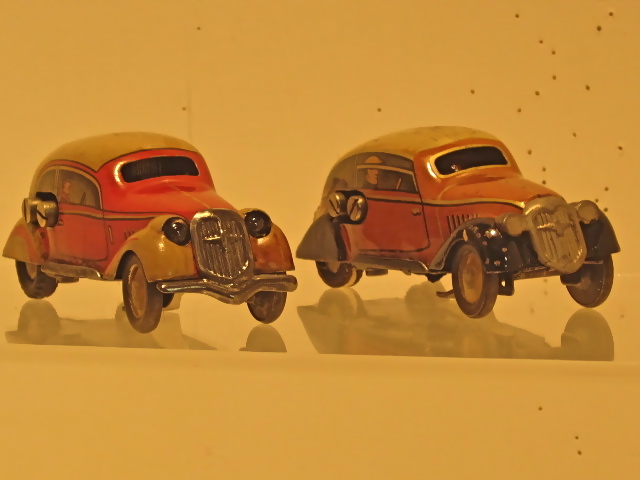 2 ADLERS WITH ELECTRIC HEAD LIGHTS. RARE 