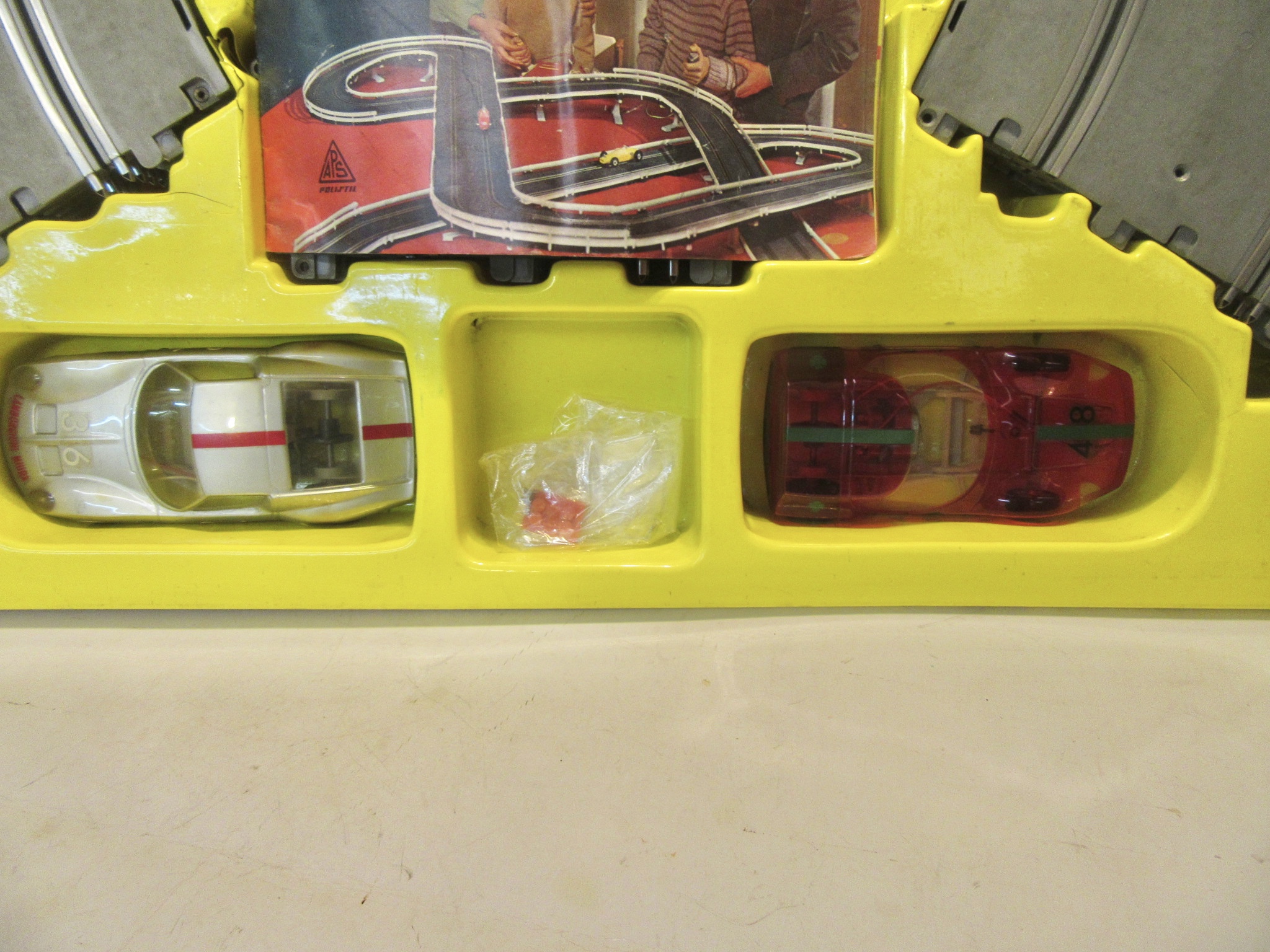 CLOSEUP OF THE 1/24TH SCALE VACUUM BODY CARS. VERY RARE