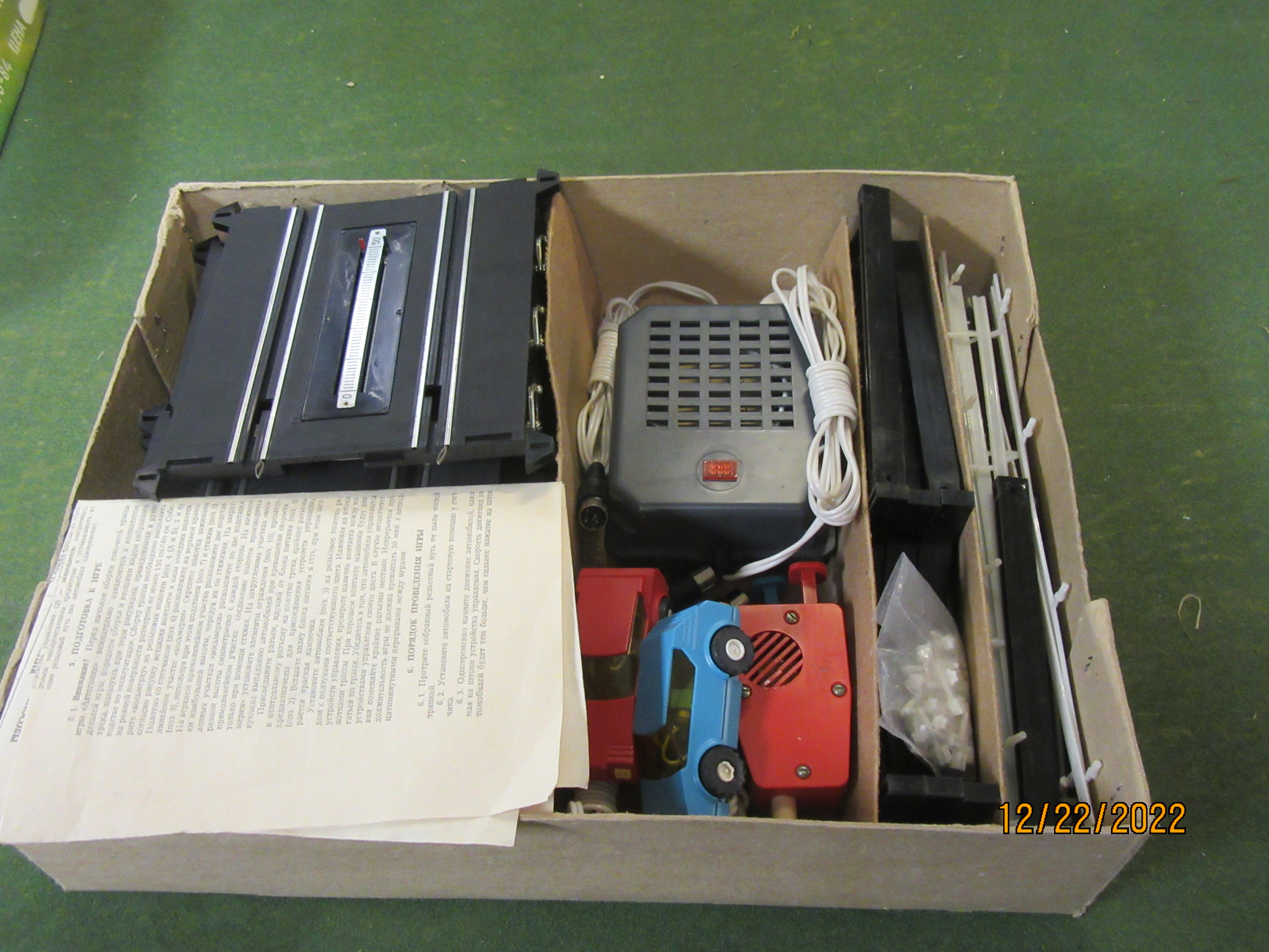 CONTENTS OF THE 1/43RD SCALE SOVIET SLOT CAR SET. RARE