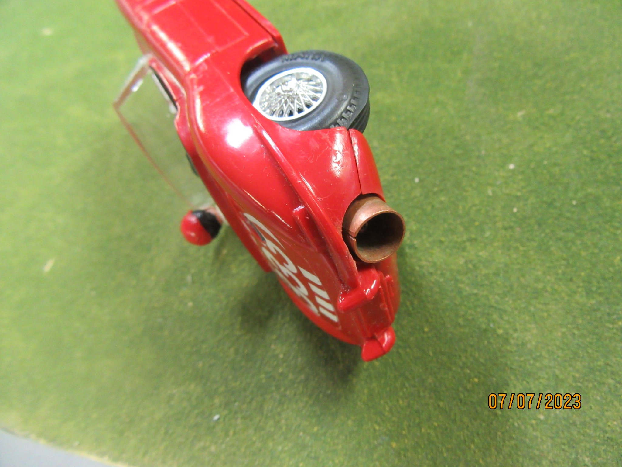 WORKING COPPER EXHAUST OF THE PROTOTYPE JAGUAR XKE