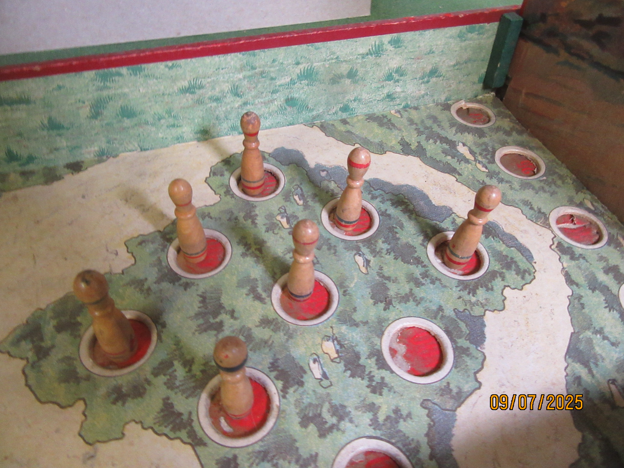 WOOD PINS WITH DIFFERENT #S UNDER THEM