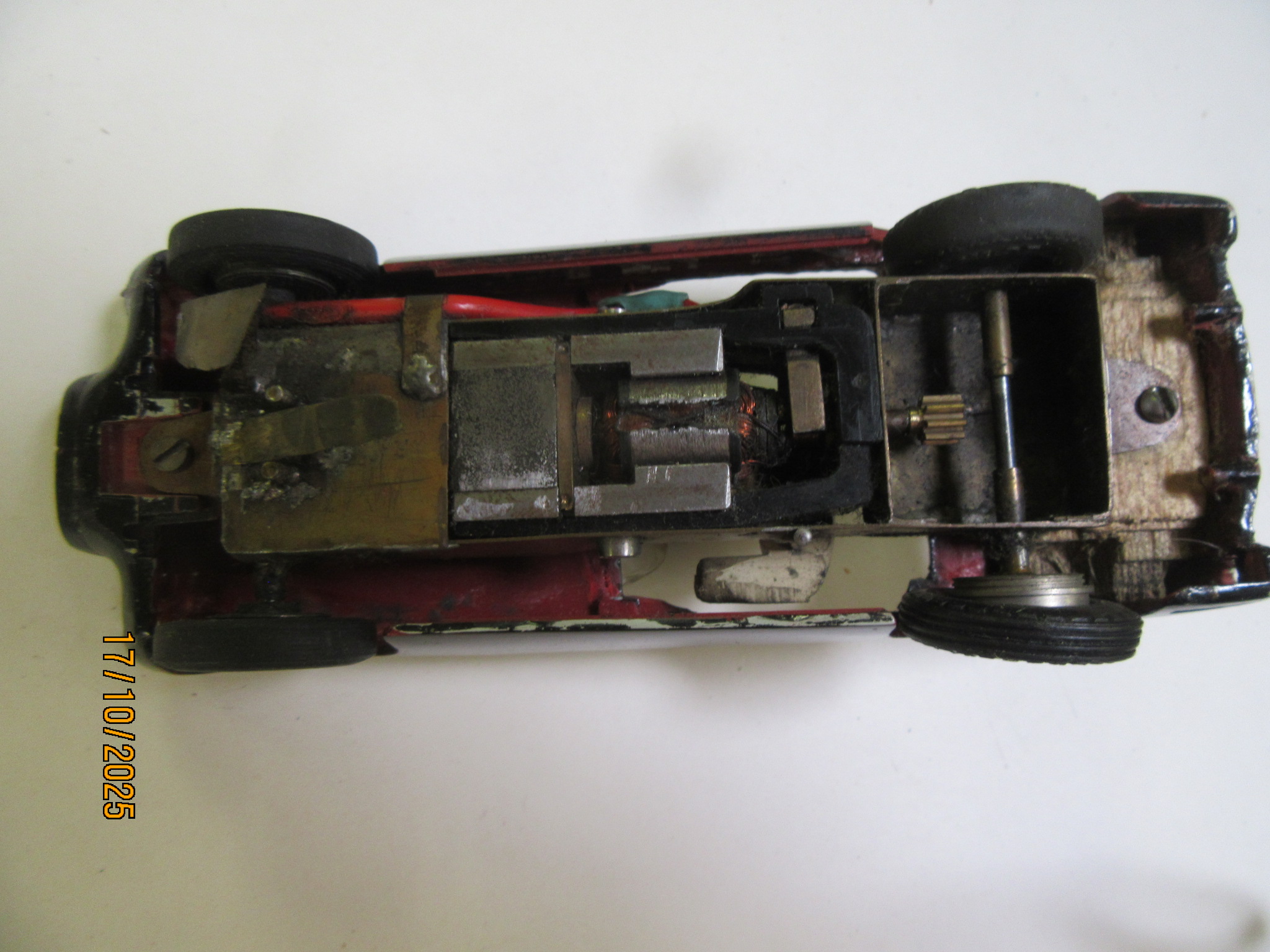 UNDERSIDE OF THE 1/32ND SCALE WOOD BODY SPORTS CAR ? RAIL CAR
