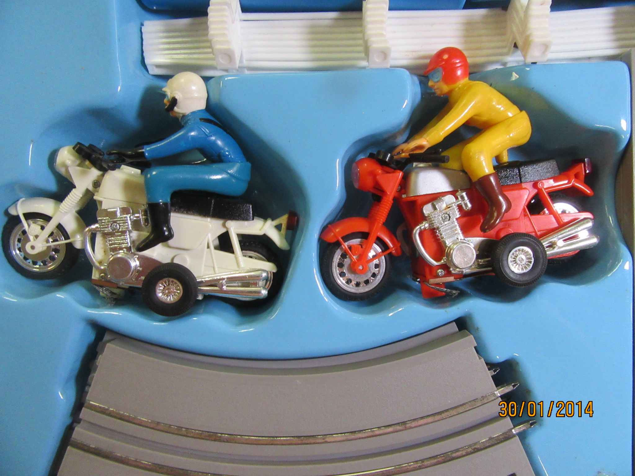 CLOSE UP OF THE POLICE & CIVILIAN MOTORCYLES.