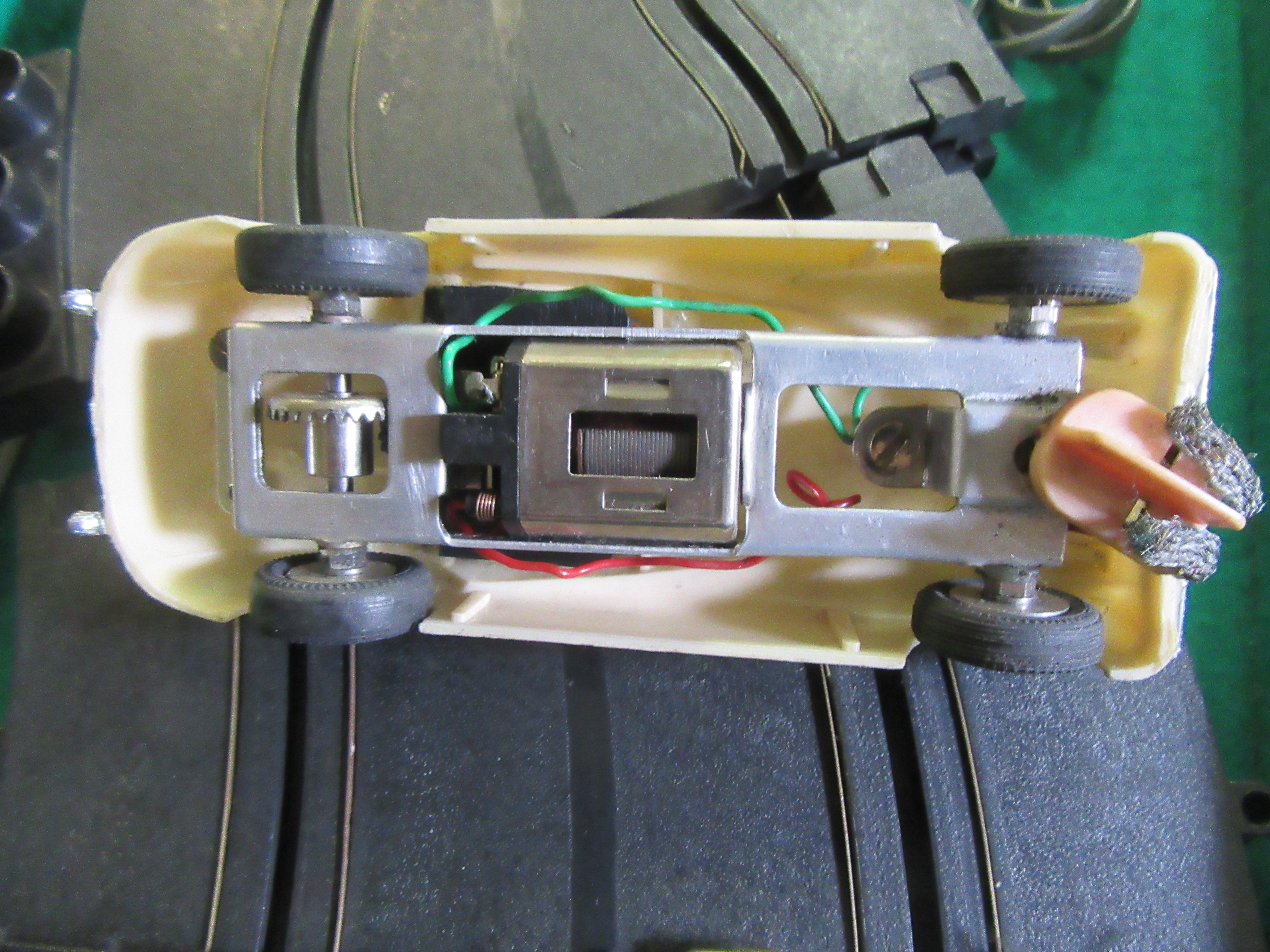 UNDERSIDE OF THE JAGUAR XK120 SHOWING THE TOKYO PLAMO CAR