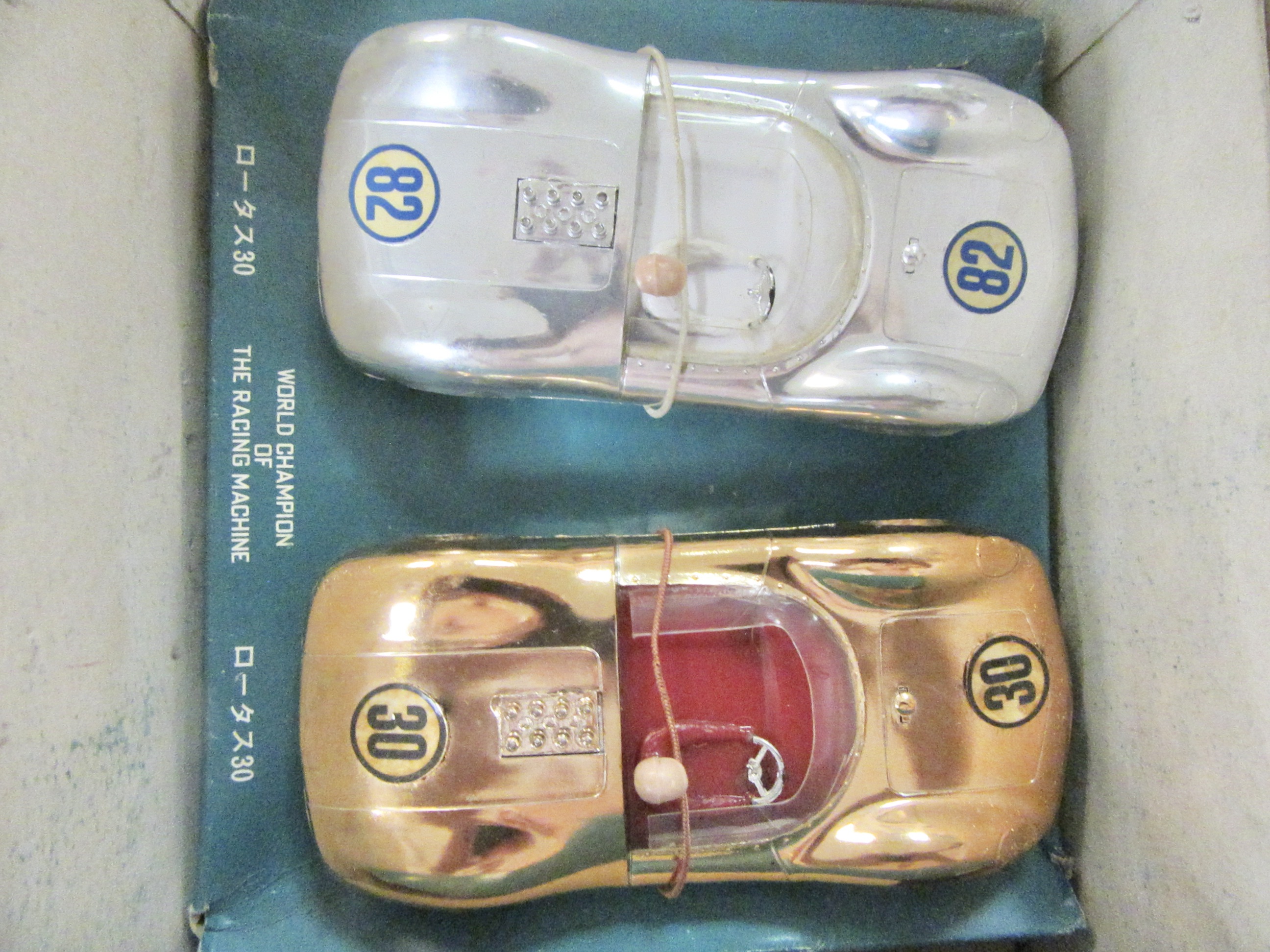 CHROME SILVER AND GOLD LOTUS 30S IN THE SET.