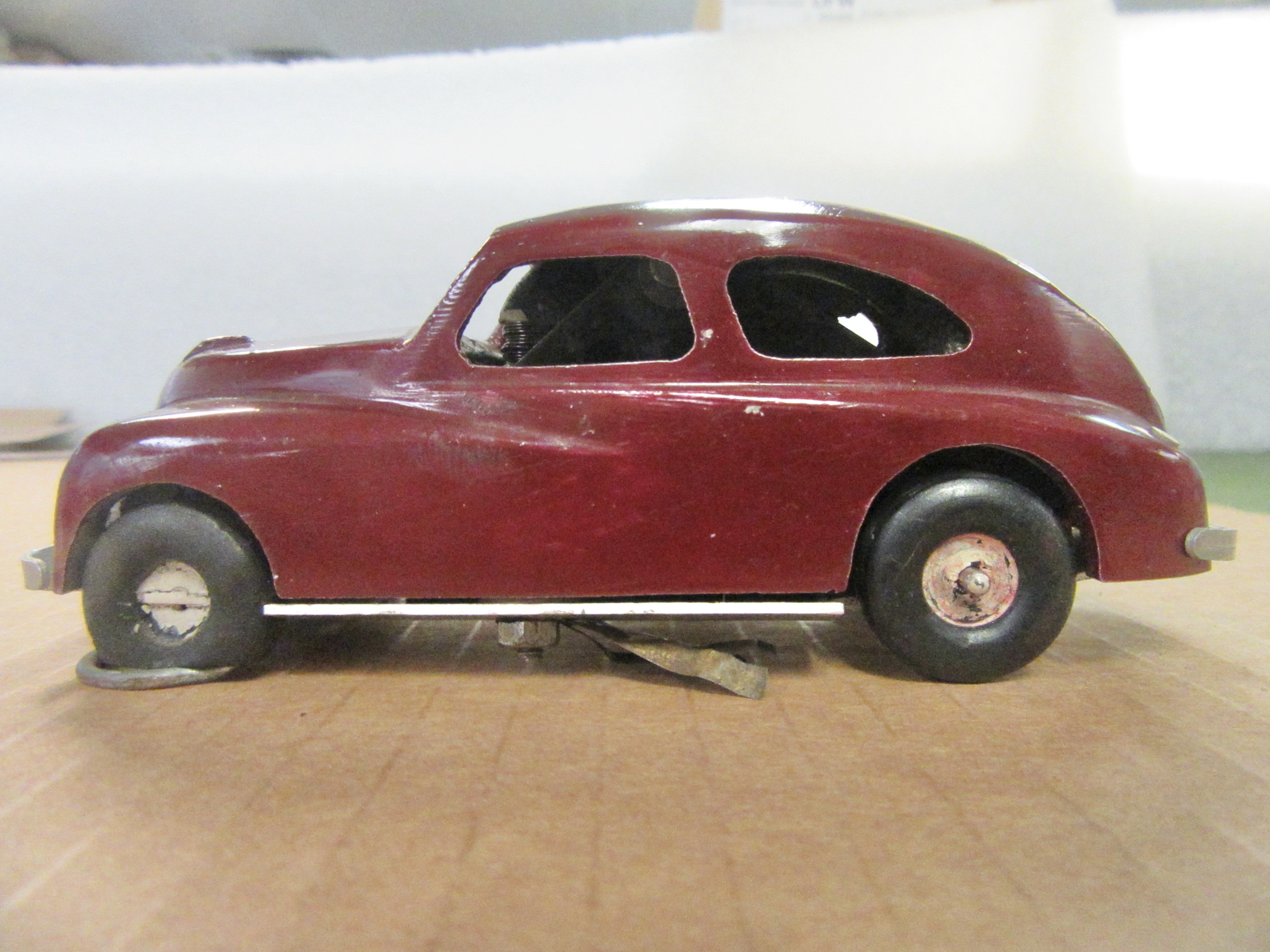 SIDE VIEW OF THE 1/30TH ? SCALE DIECAST FIAT.
