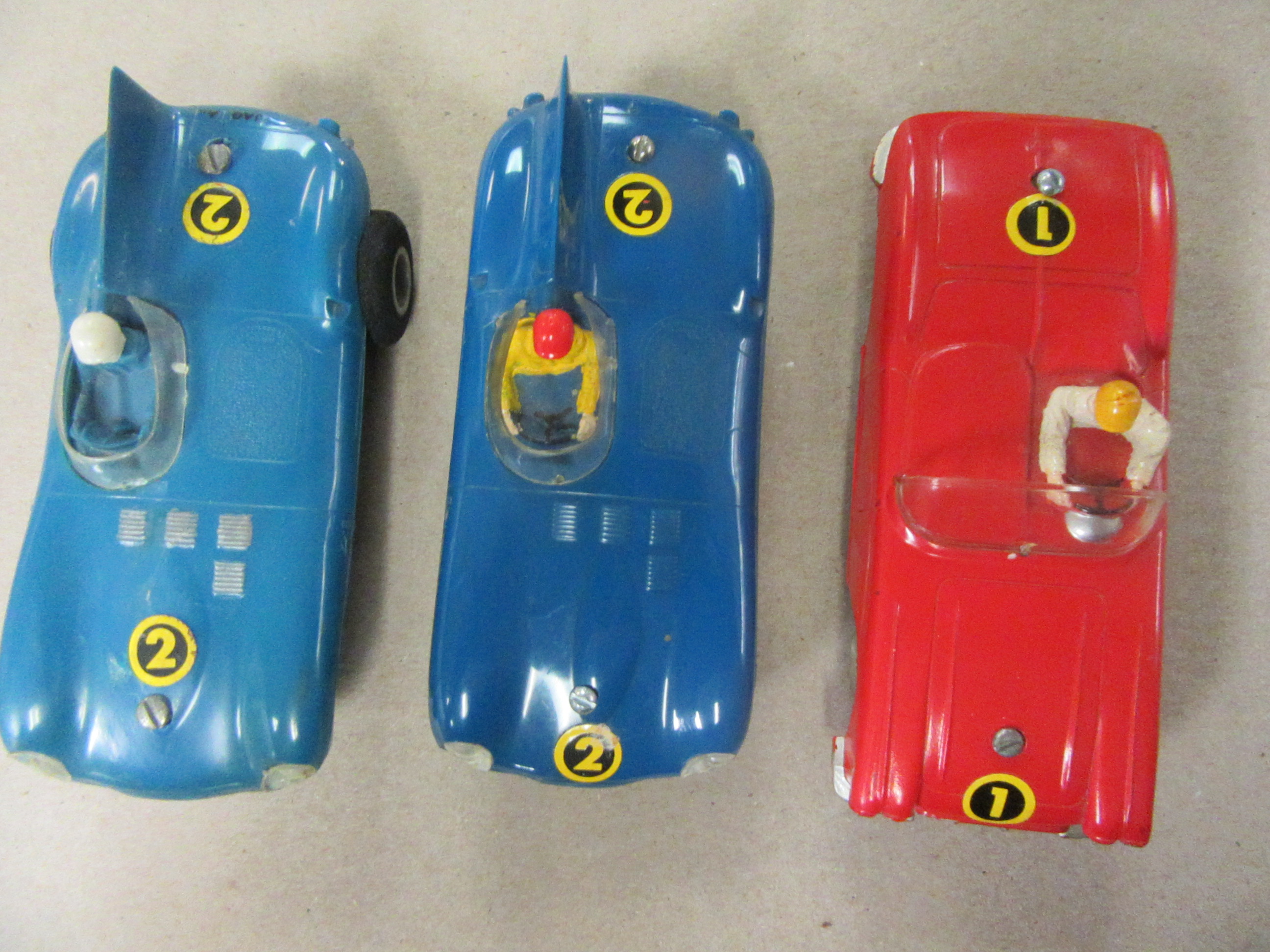 TOP VIEW OF THE 3 STROMBECKER 1/32ND SCALE ARCADE CARS. 2 JAGUAR Ds AND A CORVETTE