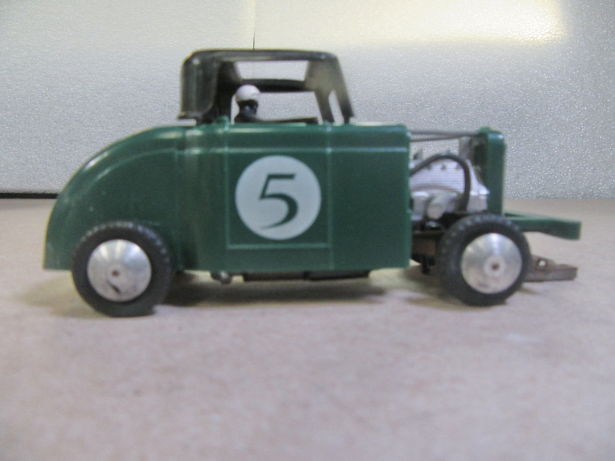 1/32ND SCALE GREEN HOT ROD. SOLD SEPARATE FROM THE SET.