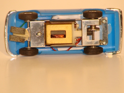 UNDERSIDE OF THE 1/40 LOTUS SHOWING THE METAL CHASSIS.