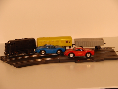 BOTH SET FERRARIS & THE TRAIN TOGETHER ON THEIR TRACK.