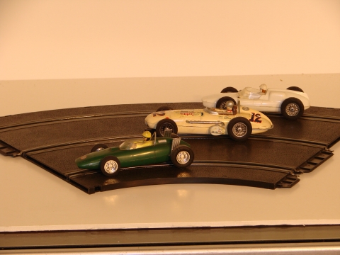 1/32ND SCALE CARS ON THE 3 LANE TRACK. FROM THE SET