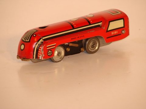 TIN TRAIN WHICH RACES THE TIN RAILCAR IN THE SET MADE IN 1938
