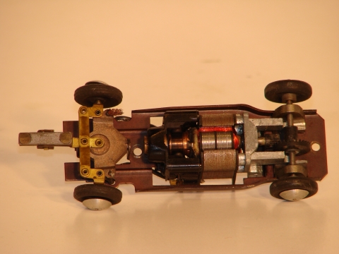 BOTTOM OF THE 1960 CHASSIS & MOTOR