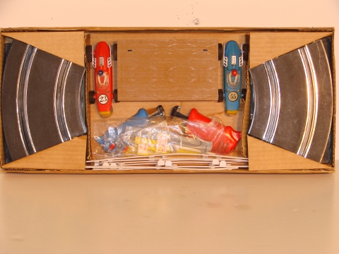 INSIDE THE 1/43RD SCALE 2 LANE SET.