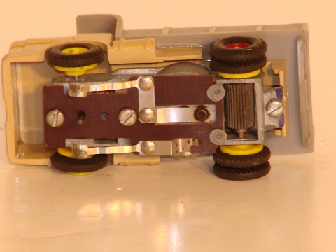 UNDERSIDE OF THE DUMP TRUCK SHOWING THE VIBRATOR MOTOR USED FROM 1960-62