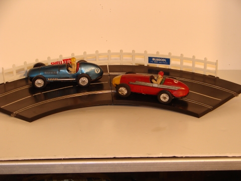 TINPLATE FERRARI & MASERATI RACING ON THE RUBBER TRACK