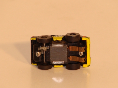 BOTTOM OF A CAR SHOWING THE CHASSIS.