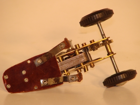 UNDERSIDE OF THE CHASSIS SHOWING THE BRUSHES