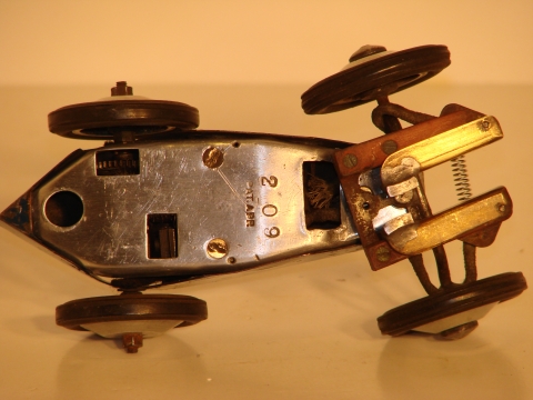 UNDERSIDE SHOWING MODIFICATIONS TO THE GUIDES FOR THE 1933 COMMERCIAL TRACK